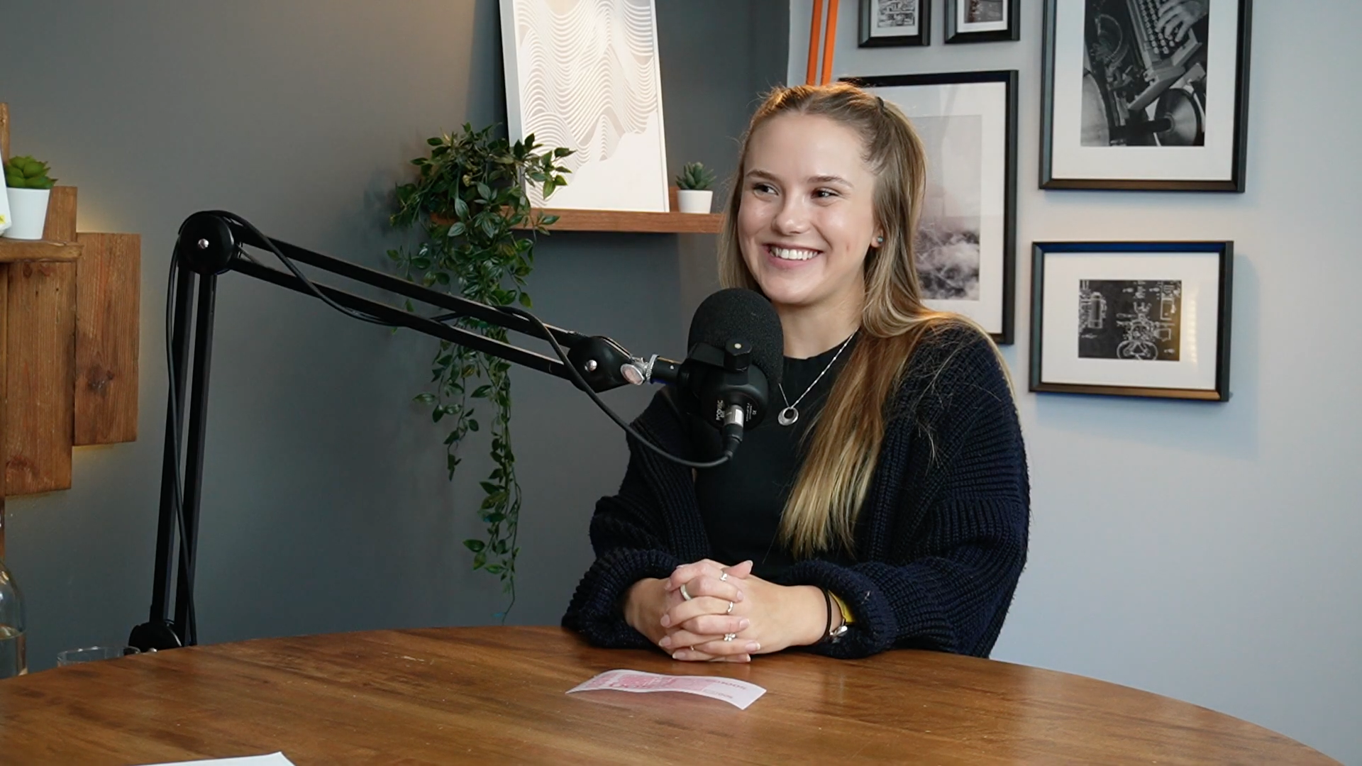 Guest smiling at microphone